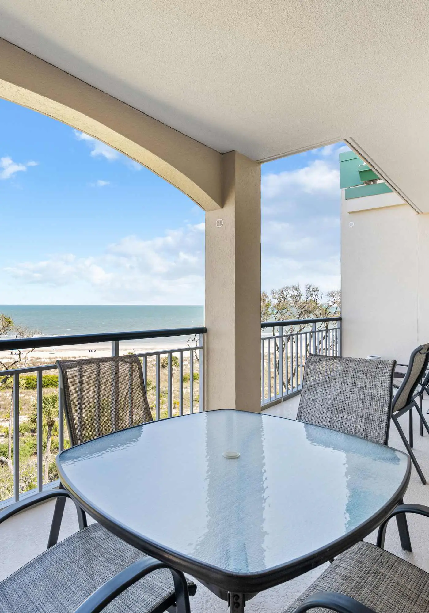 Stunning beach condo with two ocean-view balconies, shared pool & hot tub
