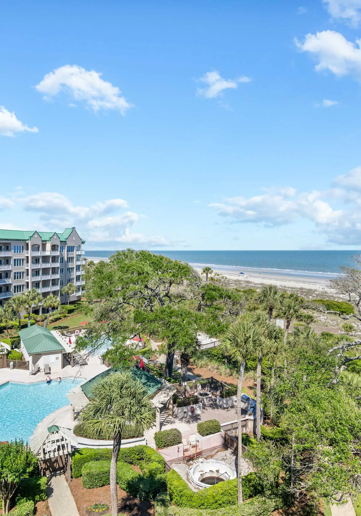 Stunning beach condo with two ocean-view balconies, shared pool & hot tub