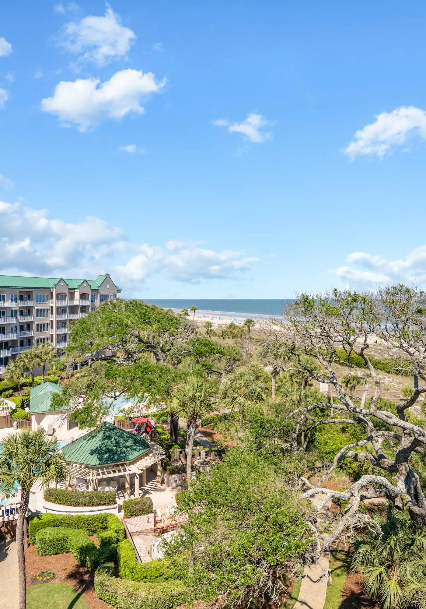 Stunning beach condo with two ocean-view balconies, shared pool & hot tub