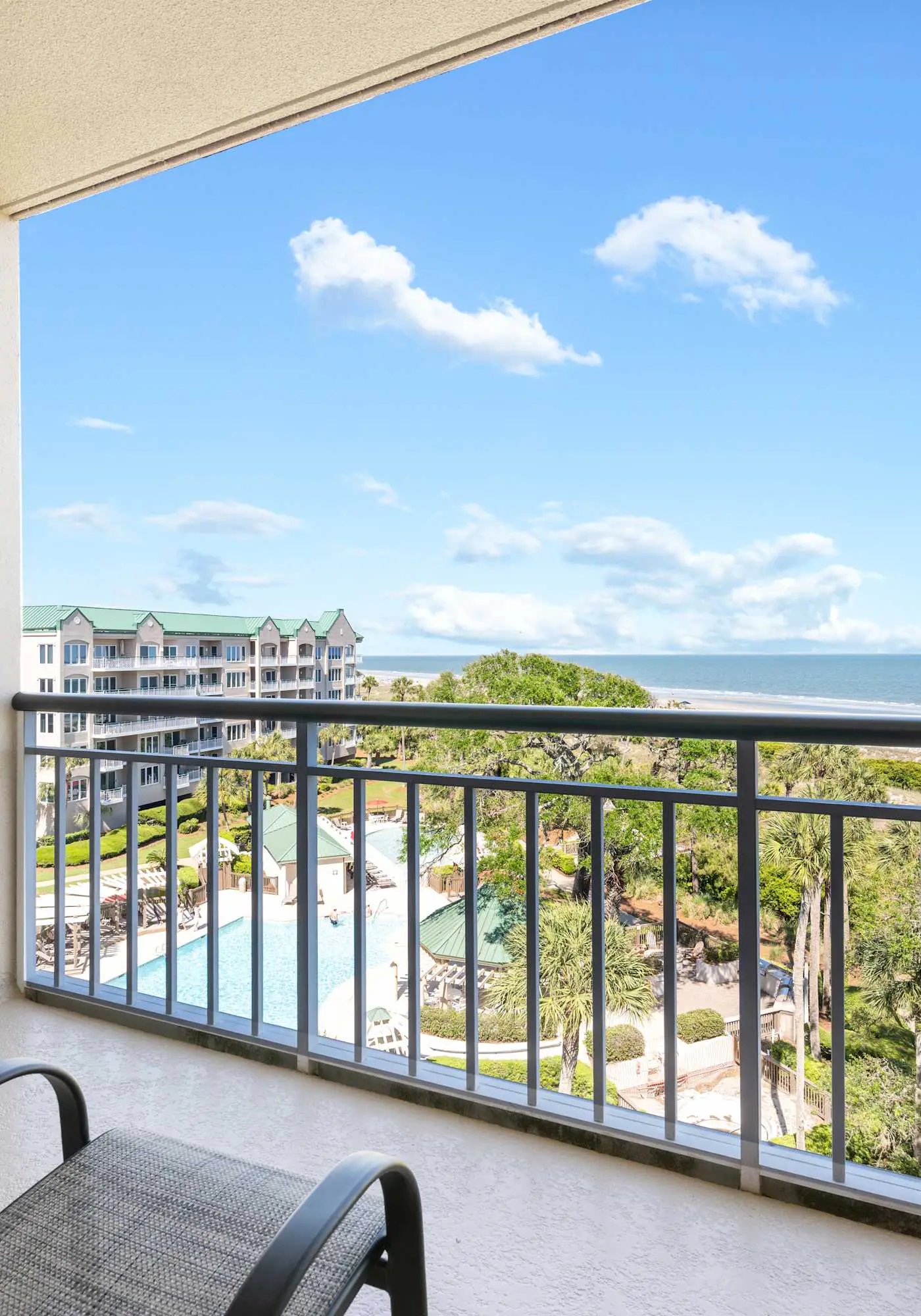 Stunning beach condo with two ocean-view balconies, shared pool & hot tub