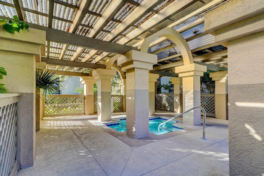 Ground-Floor Villa with Deck, Shared Pool, and Hot Tub - Near Golf and Beach