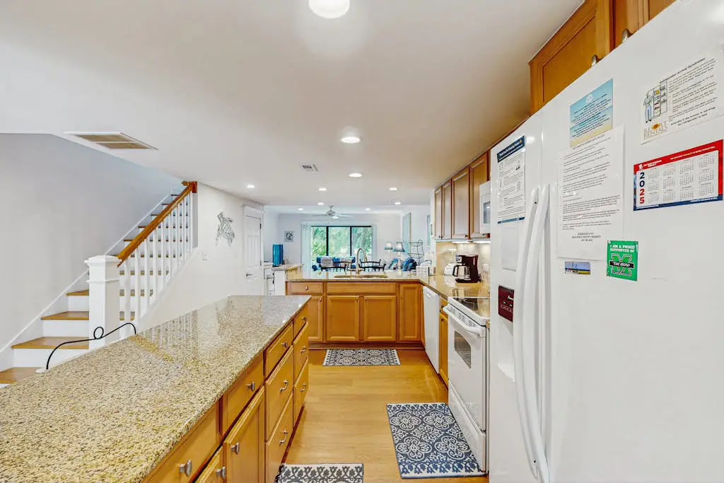 Family-Friendly Townhome with Shared Pool, Golf Course Views, and Beach Access