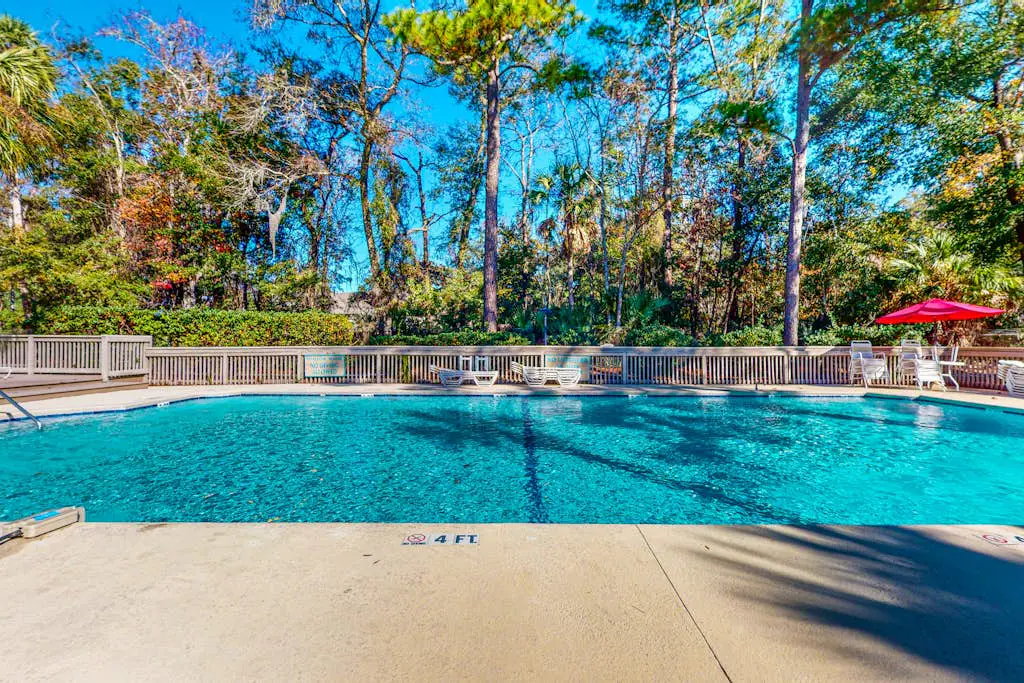 Cozy villa w/ shared pool, deck, full kitchen & more - beach access nearby