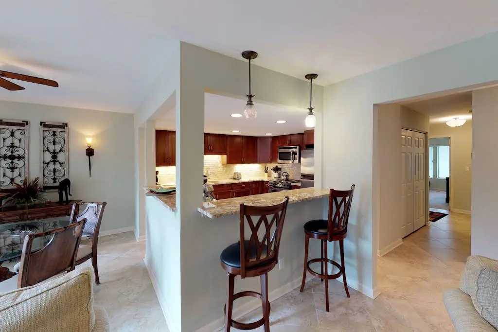 Lagoon-View Condo with Private Deck, Shared Pool & Easy Beach Access