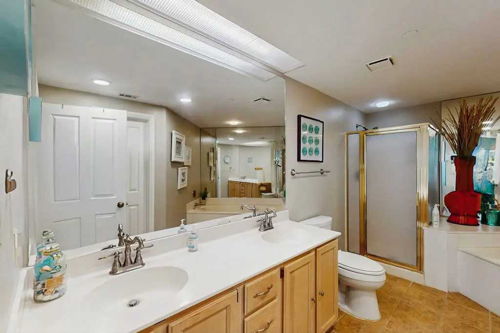 Spacious updated oceanfront condo with shared pools,  hot tub & beach access