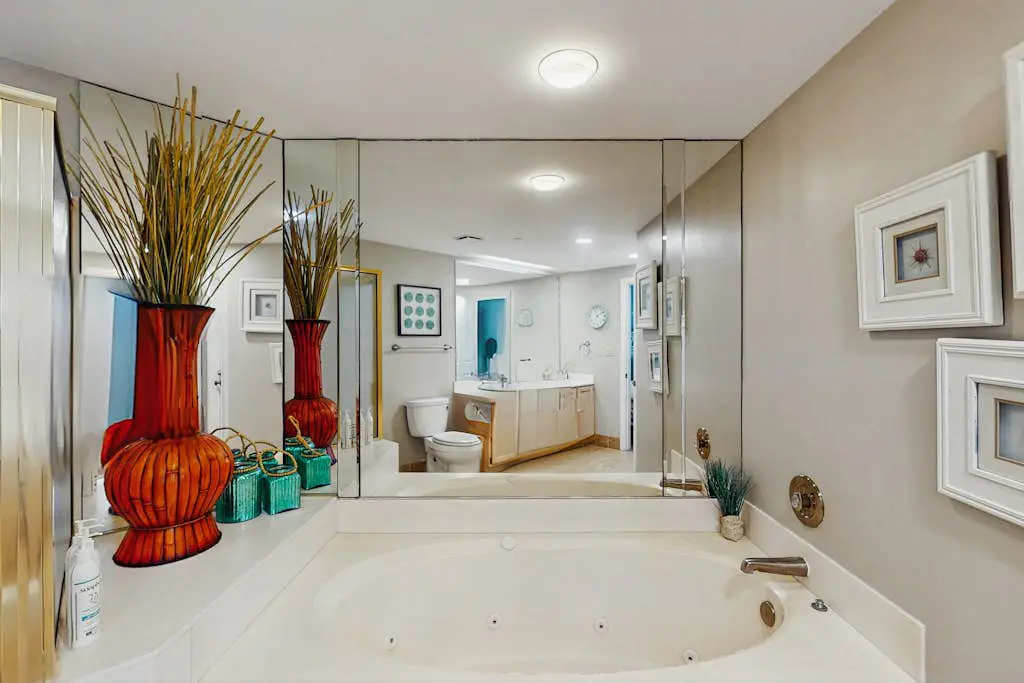 Spacious updated oceanfront condo with shared pools,  hot tub & beach access