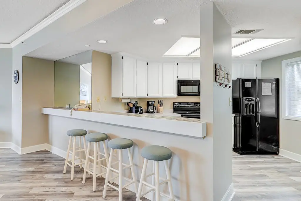 Oceanfront getaway with lagoon views, shared pool & hot tub – walk to beach