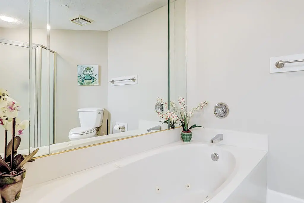 Oceanfront getaway with lagoon views, shared pool & hot tub – walk to beach
