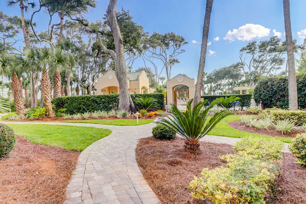 Oceanfront getaway with lagoon views, shared pool & hot tub – walk to beach