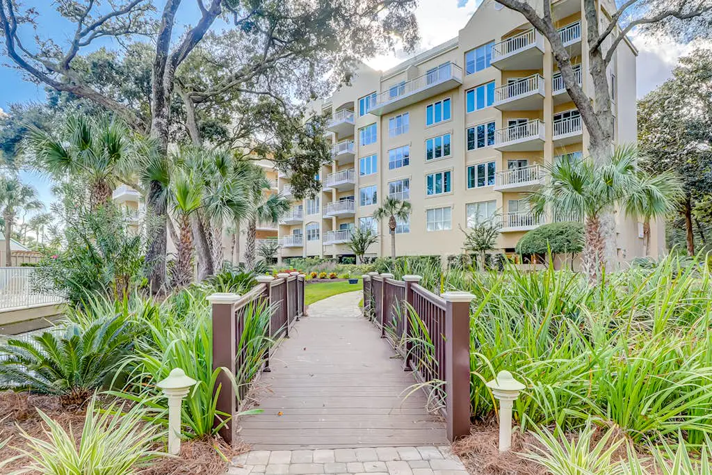 Oceanfront getaway with lagoon views, shared pool & hot tub – walk to beach