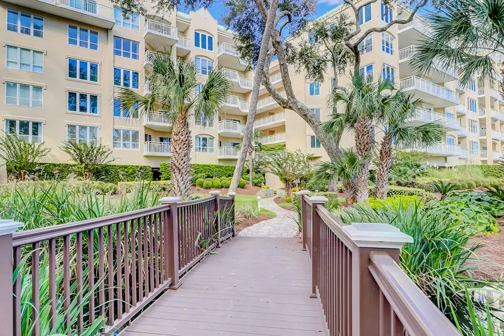 Oceanfront getaway with lagoon views, shared pool & hot tub – walk to beach