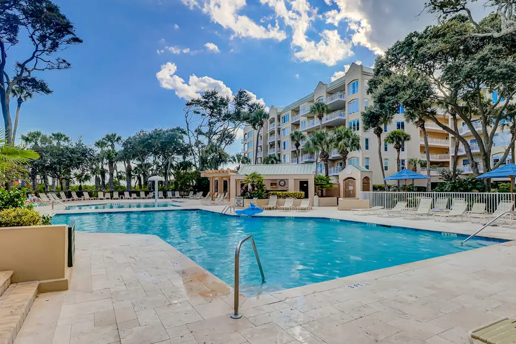Oceanfront getaway with lagoon views, shared pool & hot tub – walk to beach