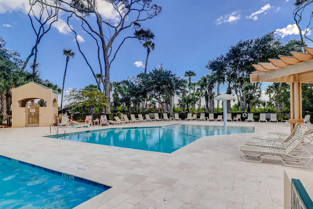 Oceanfront getaway with lagoon views, shared pool & hot tub – walk to beach