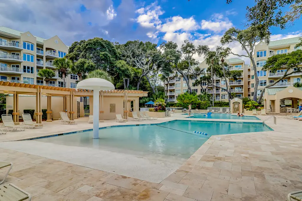 Oceanfront getaway with lagoon views, shared pool & hot tub – walk to beach