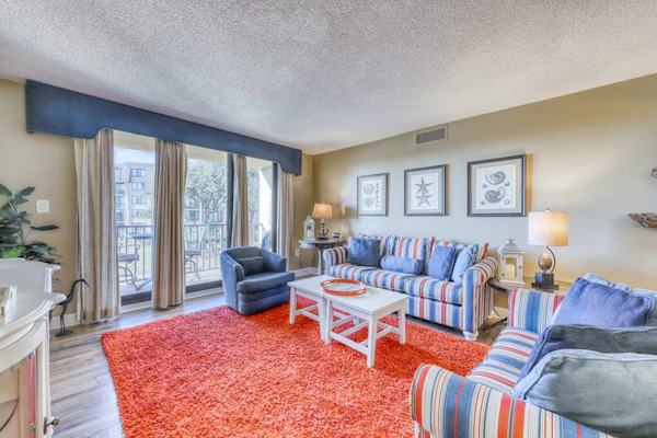 Spacious villa with pool, hot tub, playground & cute decor - steps from beach