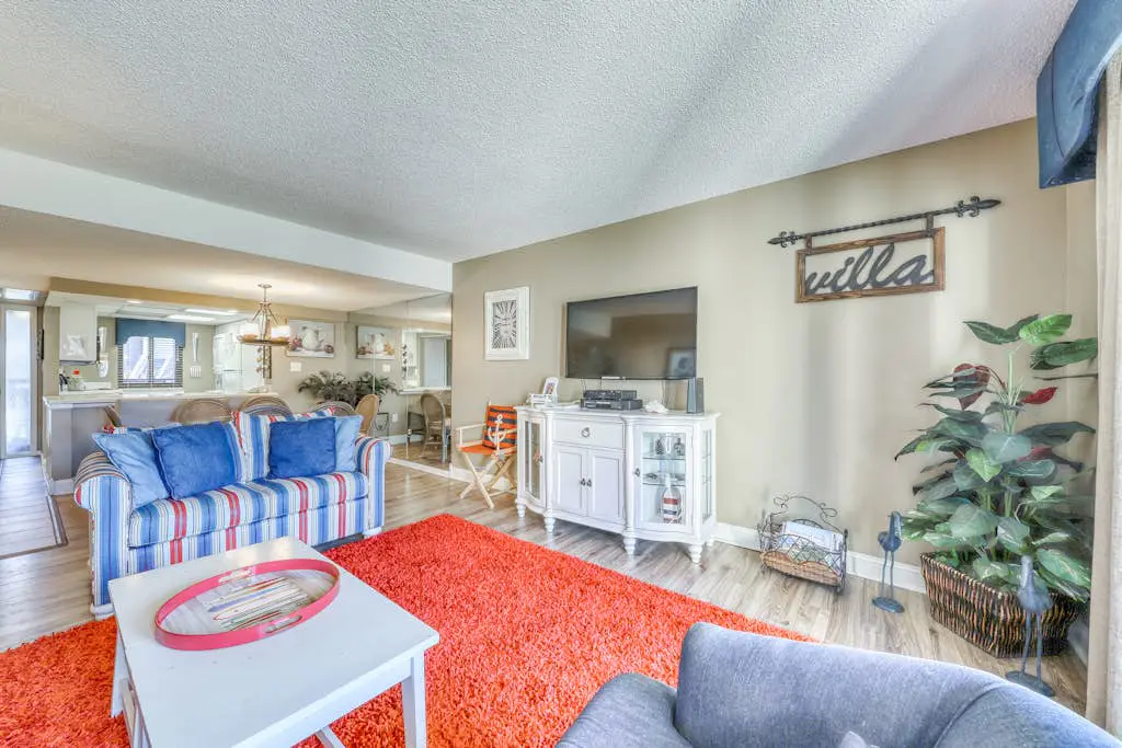 Spacious villa with pool, hot tub, playground & cute decor - steps from beach