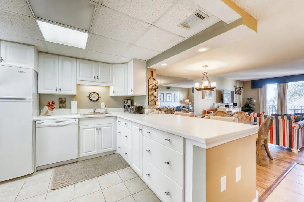 Spacious villa with pool, hot tub, playground & cute decor - steps from beach