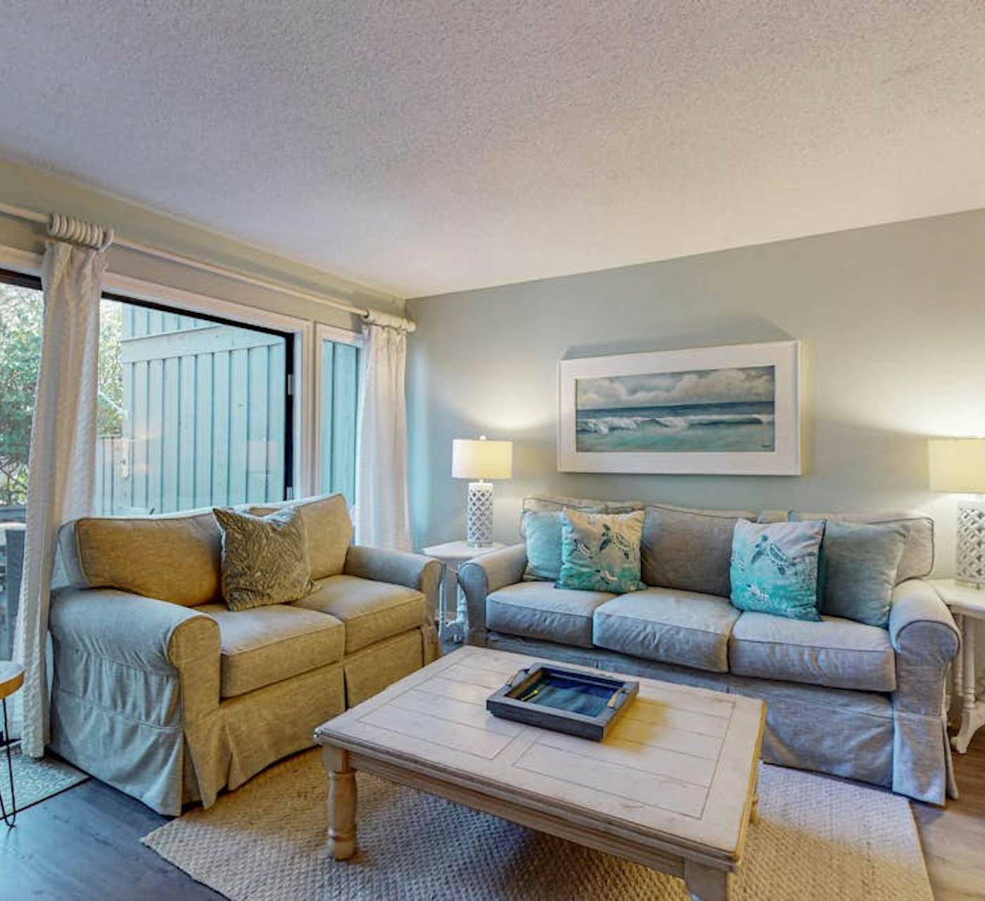 Comfortable two-story condo with beach access, shared ...