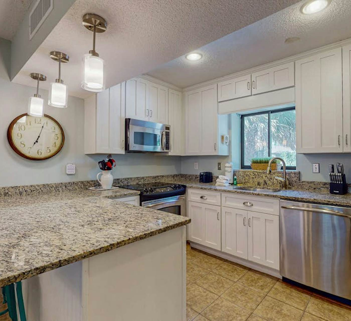 Comfortable two-story condo with beach access, shared ...
