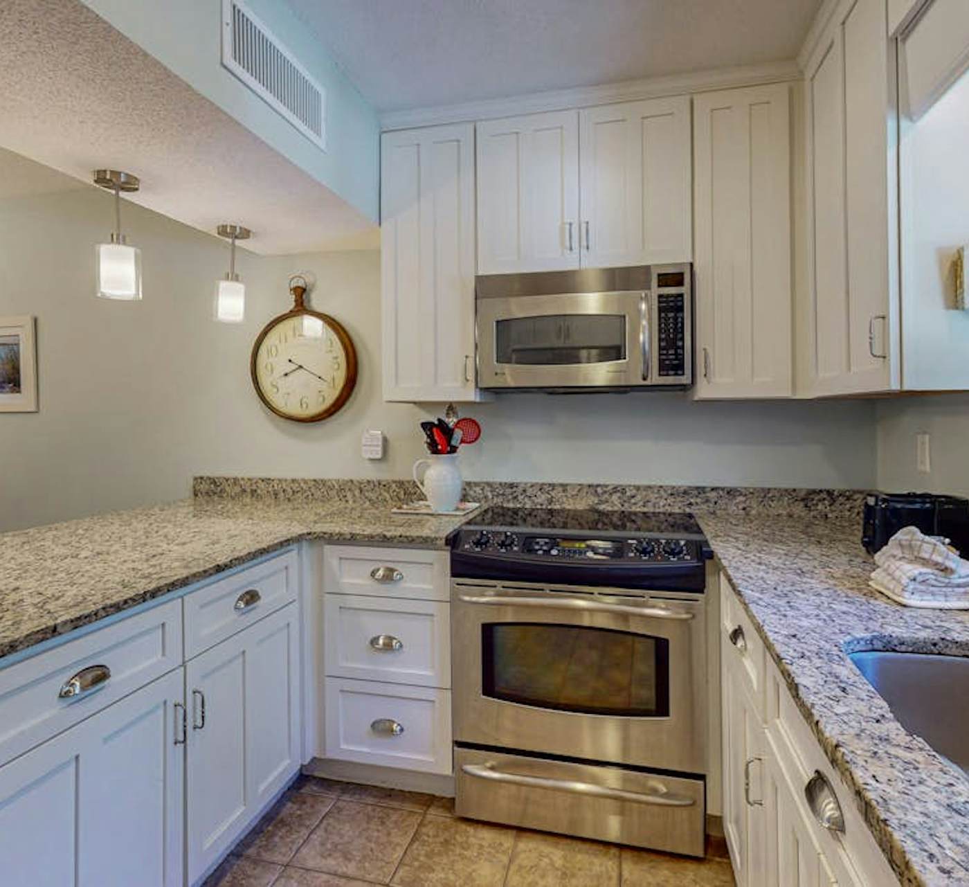 Comfortable two-story condo with beach access, shared ...