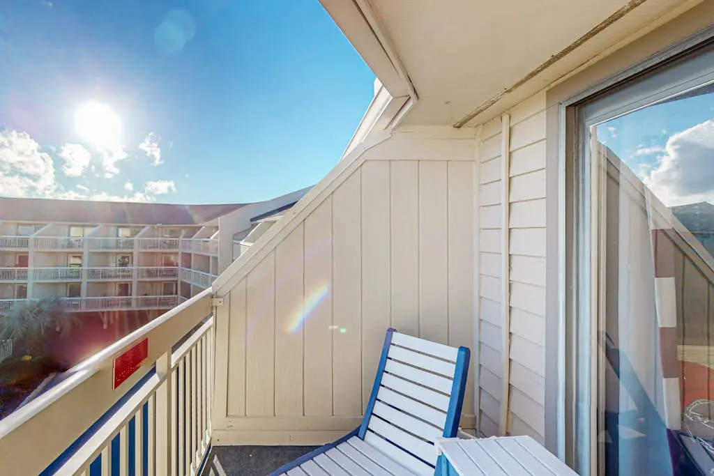 Charming Waterfront Villa with Ocean Views, Private Balcony & Pool — Steps to the Beach