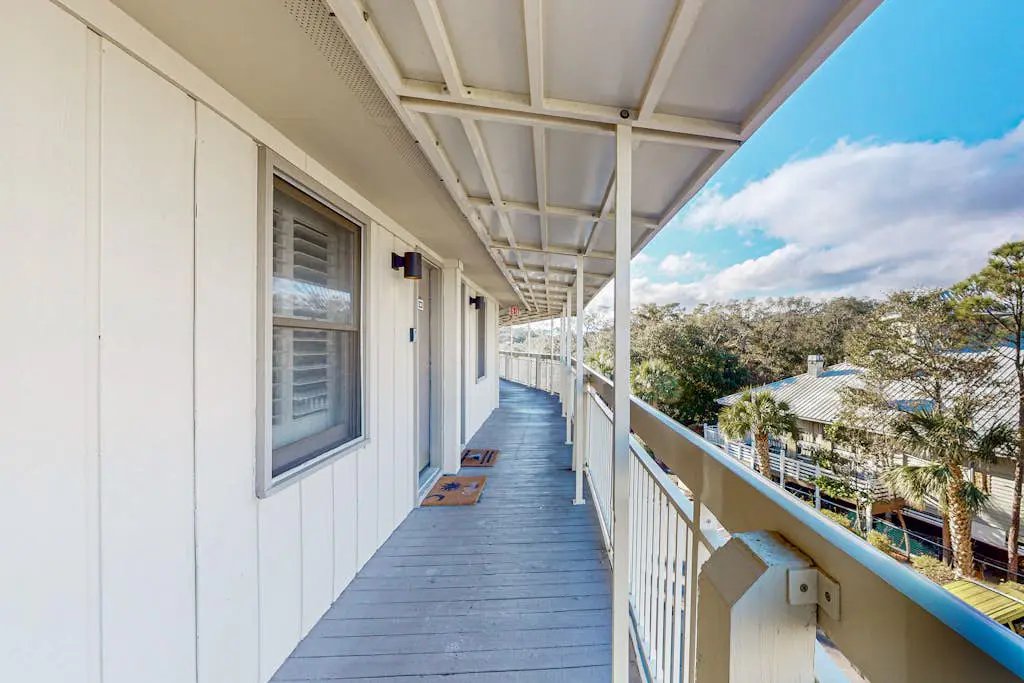 Charming Waterfront Villa with Ocean Views, Private Balcony & Pool — Steps to the Beach