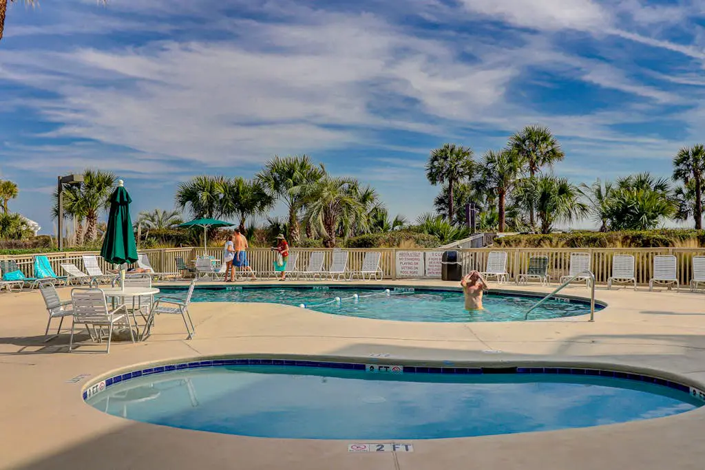 Charming Waterfront Villa with Ocean Views, Private Balcony & Pool — Steps to the Beach