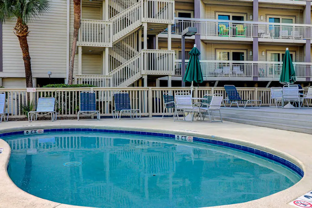 Charming Waterfront Villa with Ocean Views, Private Balcony & Pool — Steps to the Beach