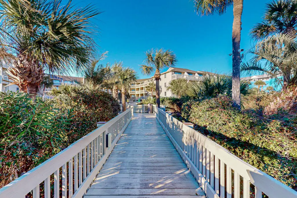 Charming Waterfront Villa with Ocean Views, Private Balcony & Pool — Steps to the Beach