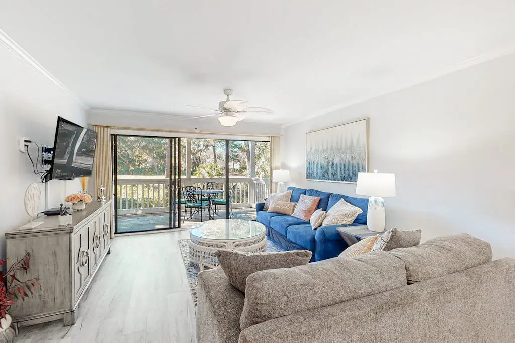 Water/golf course-view condo with private deck, on-site pool & hot tub