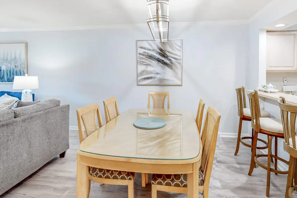 Water/golf course-view condo with private deck, on-site pool & hot tub