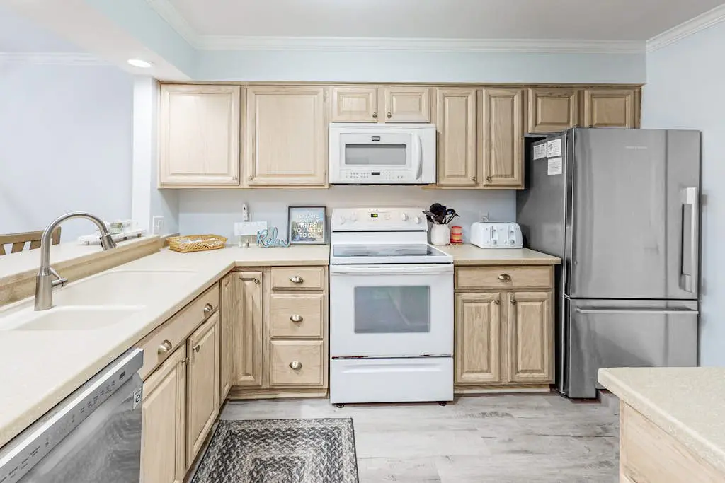 Water/golf course-view condo with private deck, on-site pool & hot tub