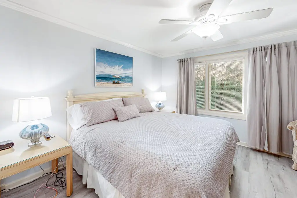 Water/golf course-view condo with private deck, on-site pool & hot tub