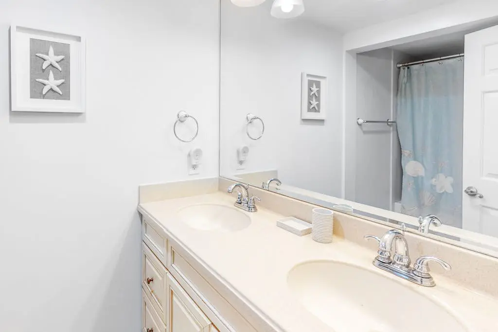 Water/golf course-view condo with private deck, on-site pool & hot tub