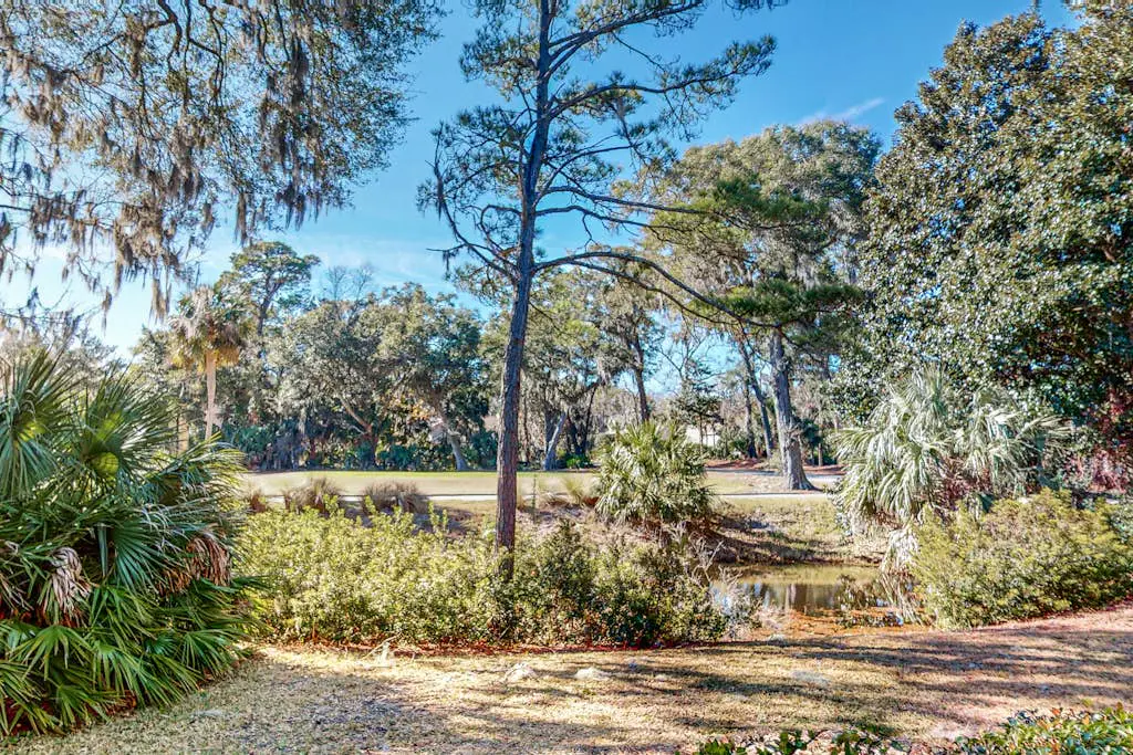 Water/golf course-view condo with private deck, on-site pool & hot tub
