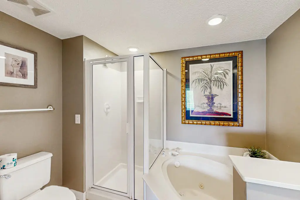 Waterfront Condo with Ocean Views, Shared Pool, Hot Tub, and Covered Balcony