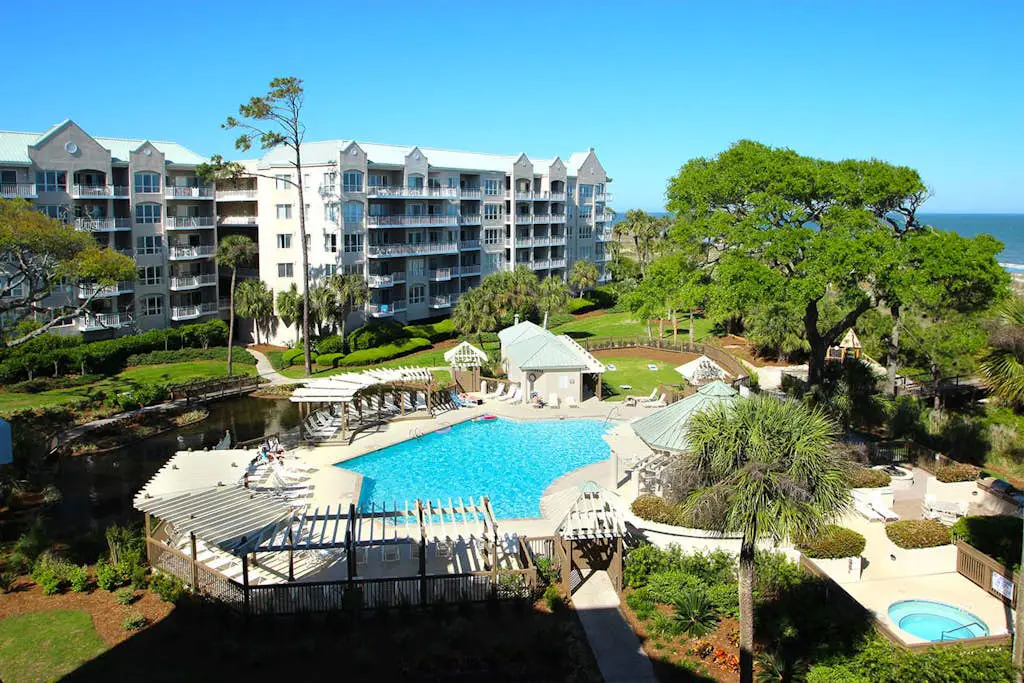 A spacious condo with community pool, hot tub, and oceanfront views