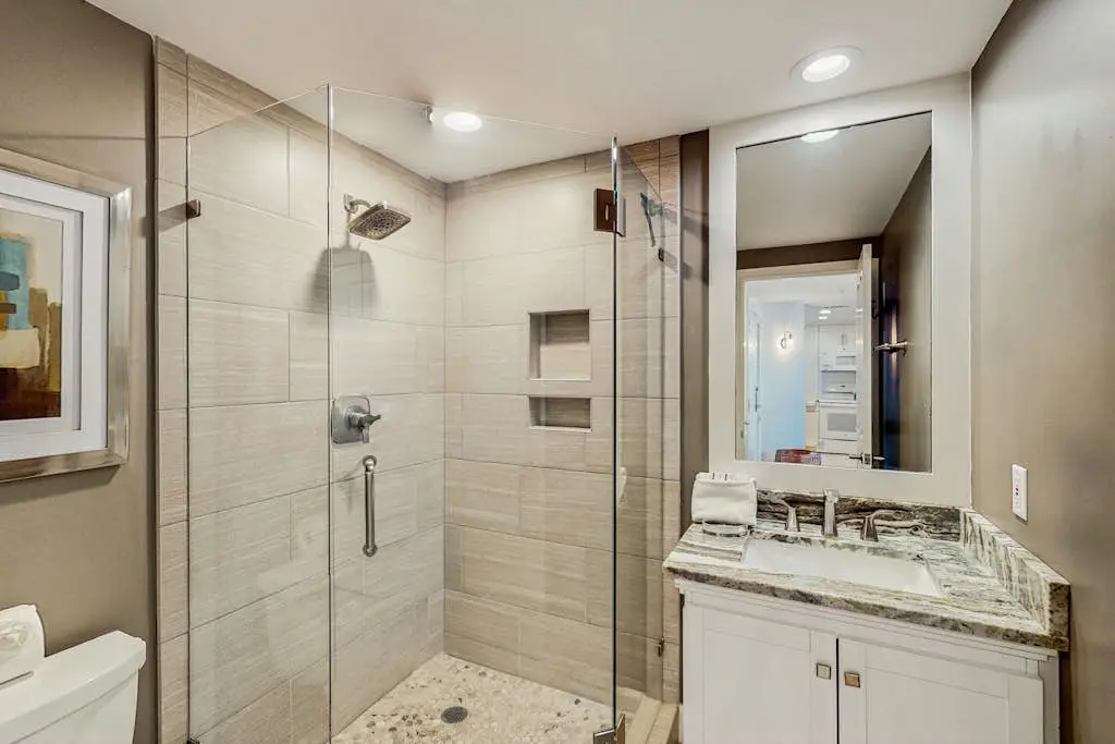A spacious condo with community pool, hot tub, and oceanfront views