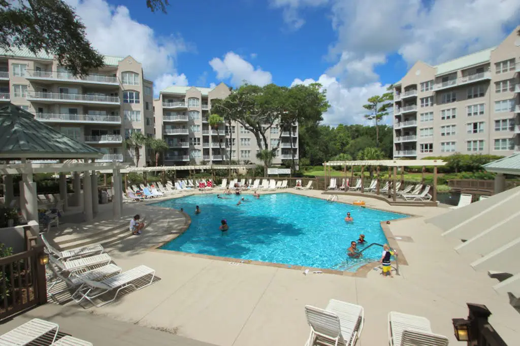 A spacious condo with community pool, hot tub, and oceanfront views