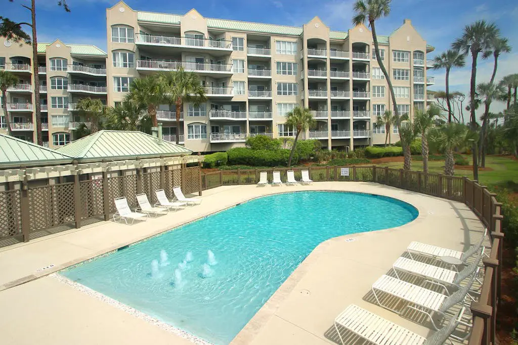 A spacious condo with community pool, hot tub, and oceanfront views