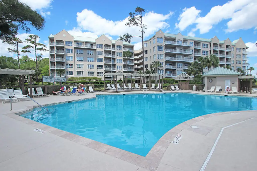 A spacious condo with community pool, hot tub, and oceanfront views