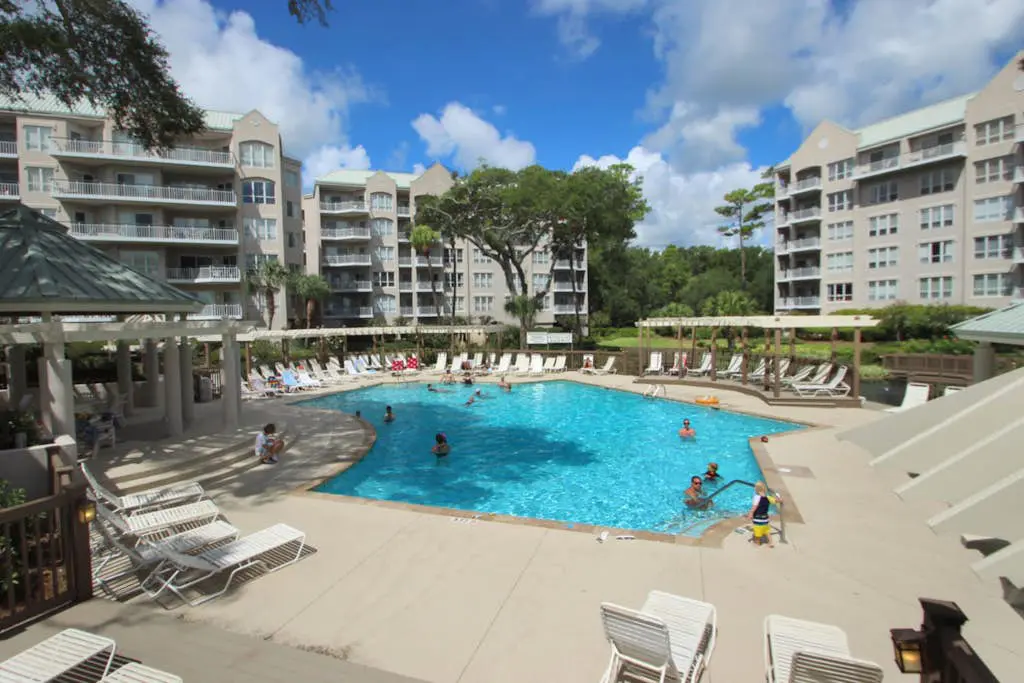 A spacious condo with community pool, hot tub, and oceanfront views
