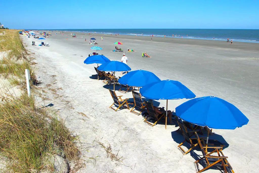 A spacious condo with community pool, hot tub, and oceanfront views