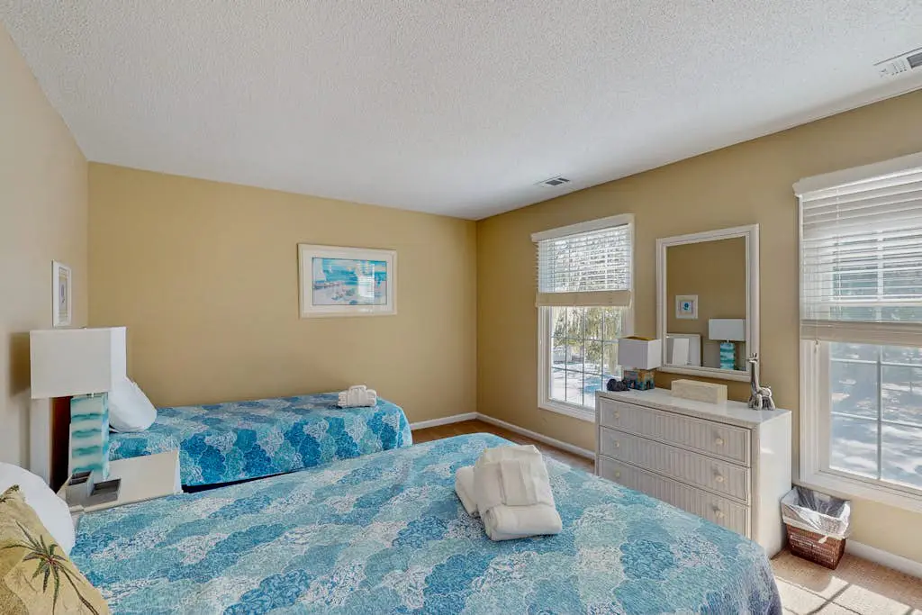 Homey second-floor villa with admittance to shared pool and close to beaches