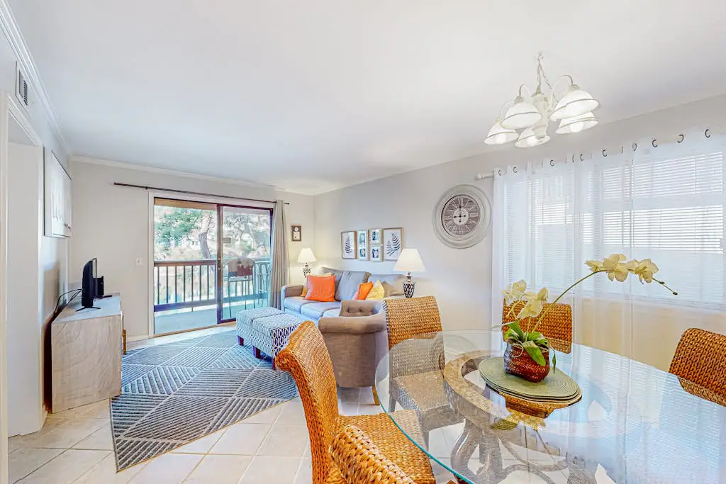 Water view retreat with balcony, beach gear, pools, tennis, hot tub, & gym