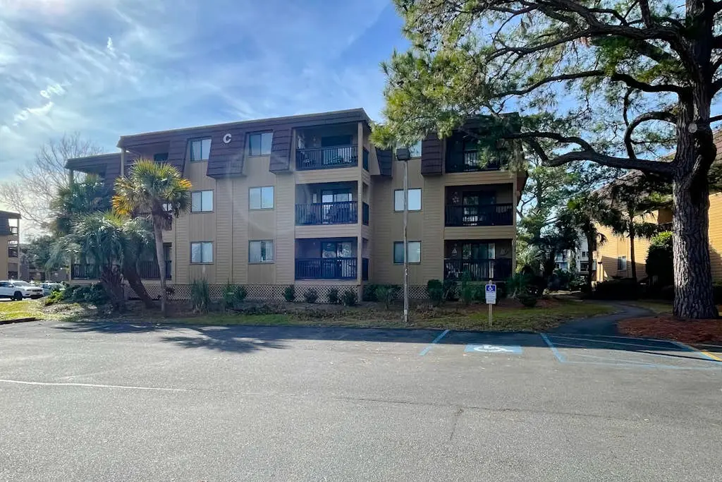 Water view retreat with balcony, beach gear, pools, tennis, hot tub, & gym