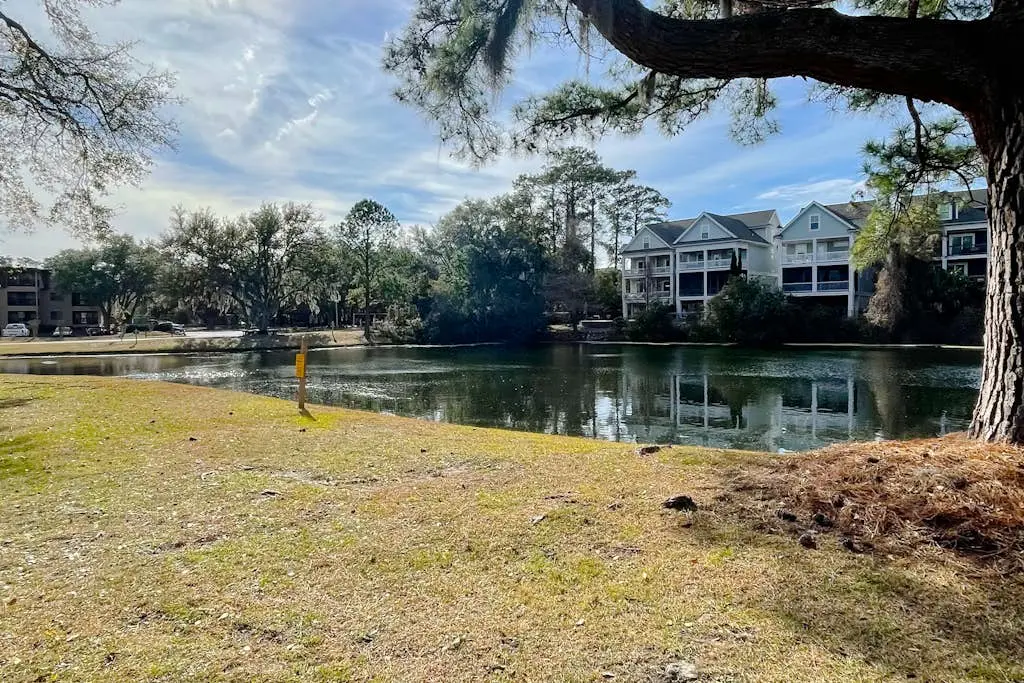 Water view retreat with balcony, beach gear, pools, tennis, hot tub, & gym