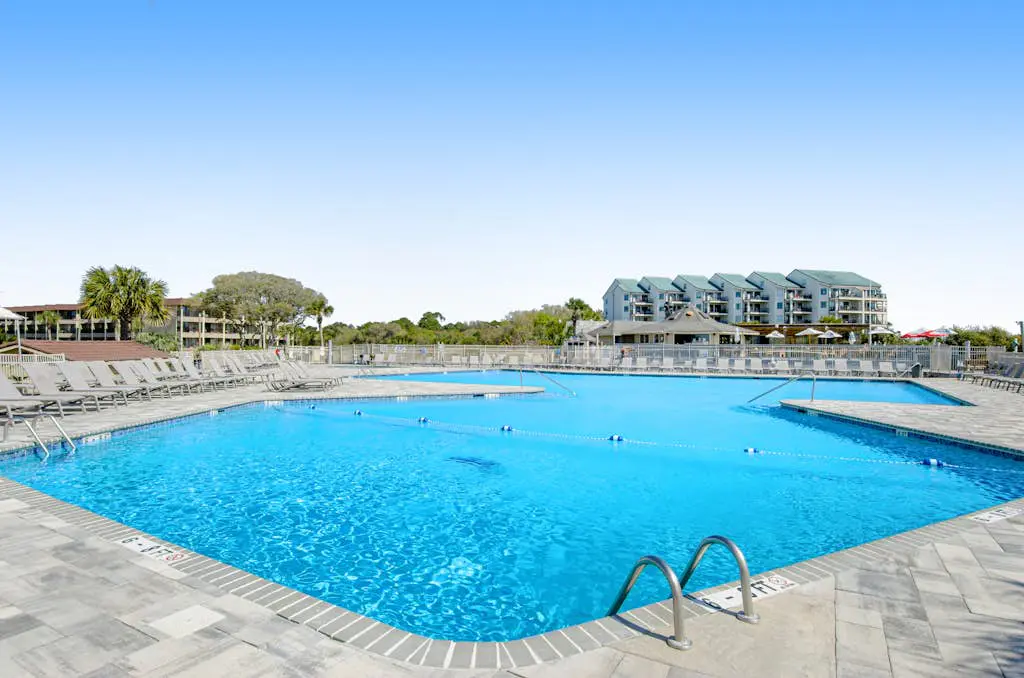 Water view retreat with balcony, beach gear, pools, tennis, hot tub, & gym