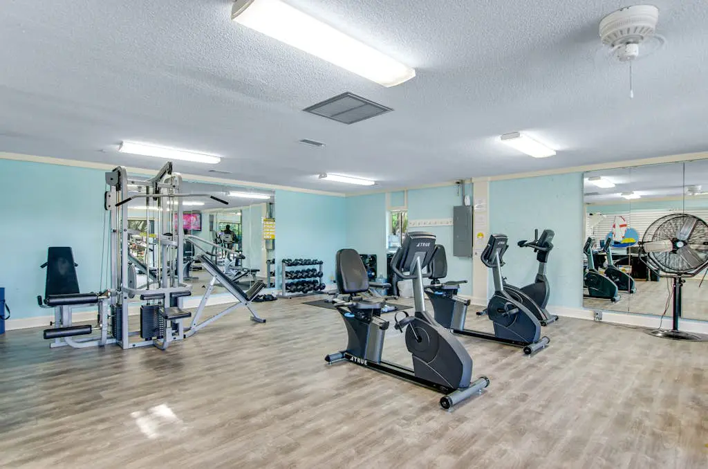 Water view retreat with balcony, beach gear, pools, tennis, hot tub, & gym