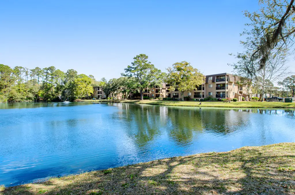 Water view retreat with balcony, beach gear, pools, tennis, hot tub, & gym